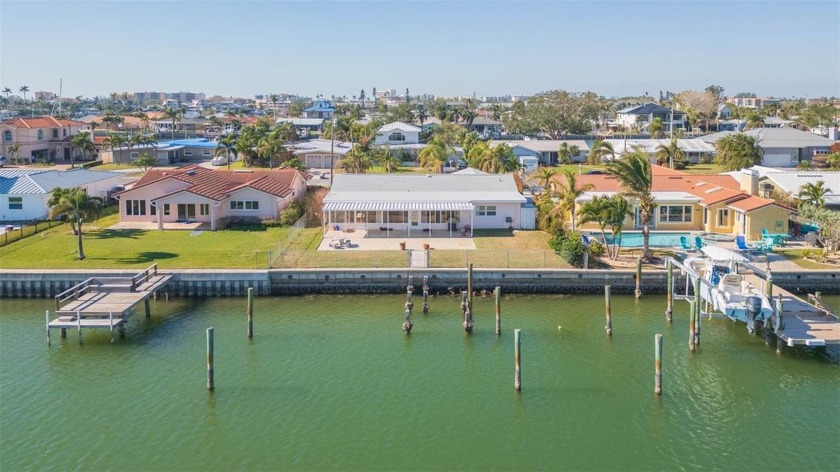 Nestled along 70 feet of spectacular intracoastal waterfront on - Beach Home for sale in Treasure Island, Florida on Beachhouse.com