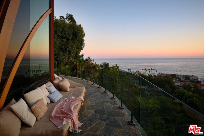 Situated on a 1-acre hilltop lot, with stunning head on views of - Beach Home for sale in Malibu, California on Beachhouse.com