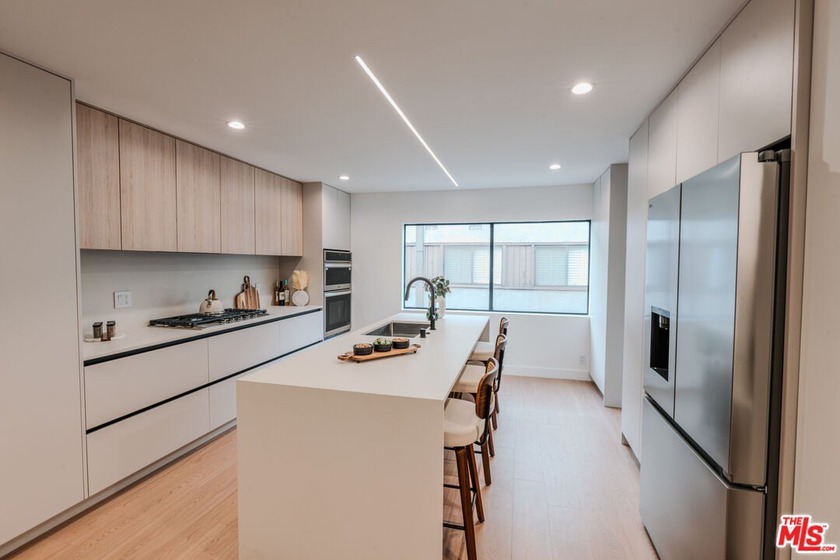 Indulge in luxury coastal living with this extensively renovated - Beach Condo for sale in Marina Del Rey, California on Beachhouse.com