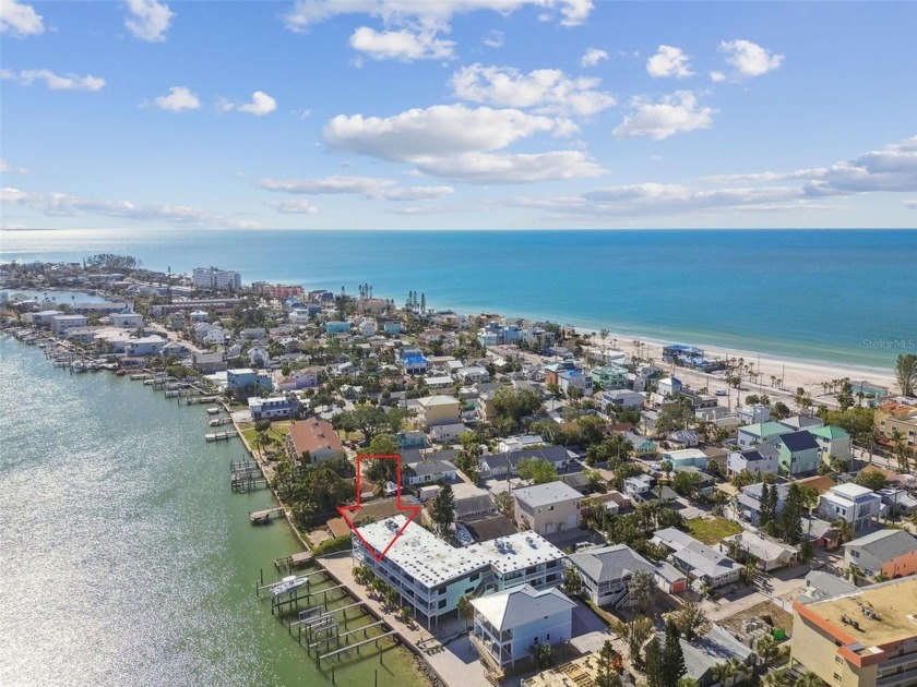 Step into your dream WATERFRONT oasis at this stunning Keywest - Beach Condo for sale in Treasure Island, Florida on Beachhouse.com