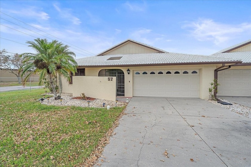 This home is the epitome of Florida living! Nestled in the - Beach Home for sale in Venice, Florida on Beachhouse.com