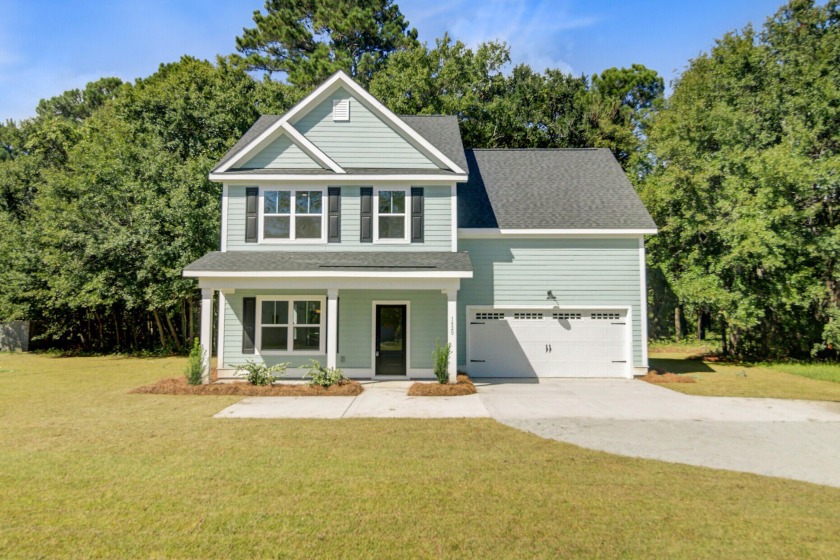 Tucked away on a serene, wooded lot in the heart of James Island - Beach Home for sale in Charleston, South Carolina on Beachhouse.com