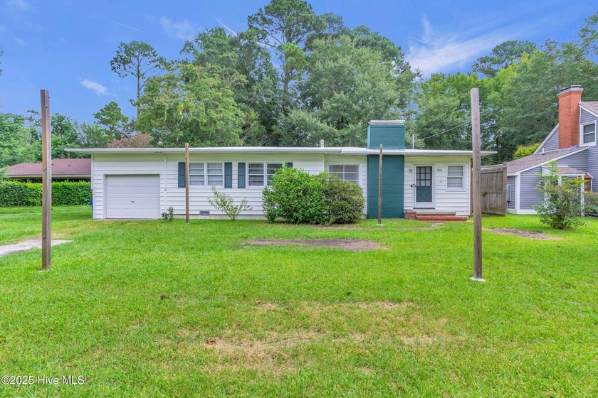 Step into this one-of-a-kind mid-century time capsule tucked in - Beach Home for sale in Wilmington, North Carolina on Beachhouse.com