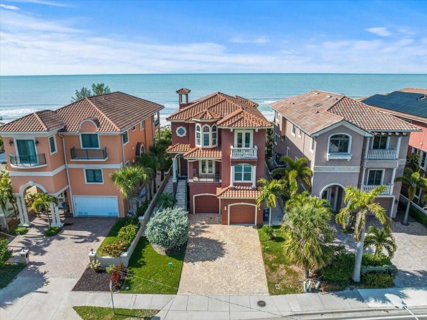 Welcome to this spectacular gulf front home sitting directly on - Beach Home for sale in Treasure Island, Florida on Beachhouse.com