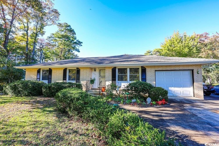 Just a half mile from the shore, this beautifully updated - Beach Home for sale in Myrtle Beach, South Carolina on Beachhouse.com