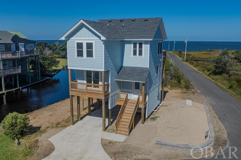 Welcome to your dream waterfront retreat! This newly constructed - Beach Home for sale in Frisco, North Carolina on Beachhouse.com