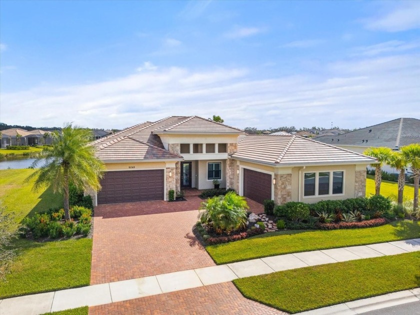 Welcome home to this stunning Whitaker residence, built in 2022 - Beach Home for sale in Sarasota, Florida on Beachhouse.com