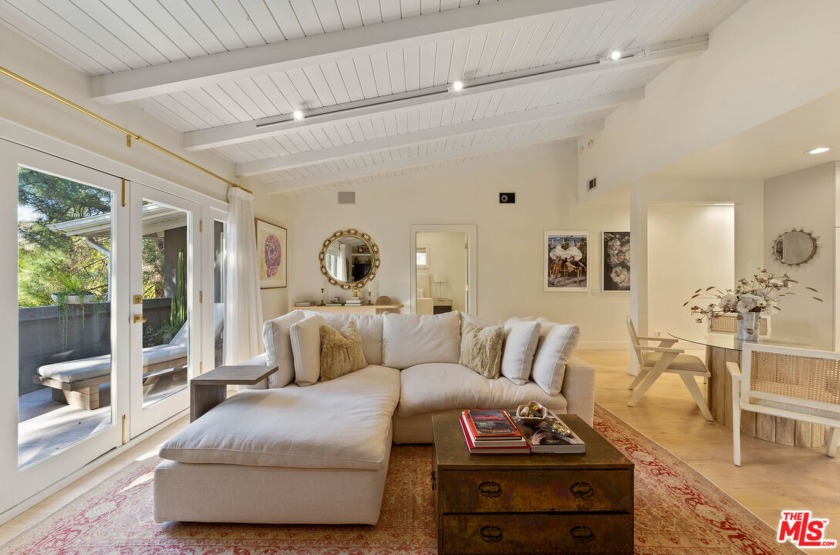 This chic, stylish, and 2-bedroom, 2-bathroom home is nestled on - Beach Home for sale in Pacific Palisades, California on Beachhouse.com