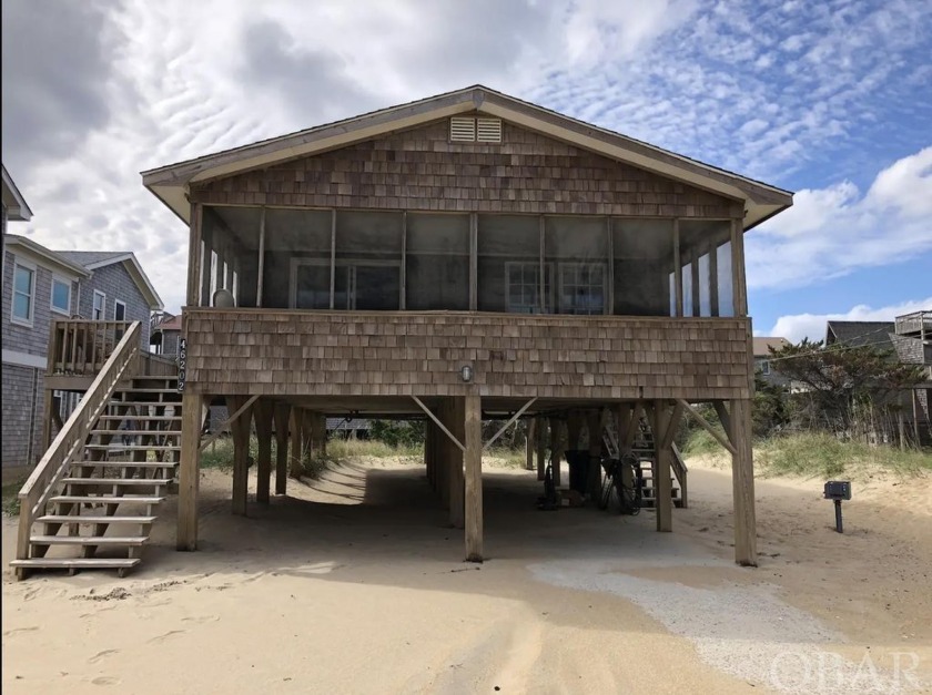 Welcome to your dream beach getaway! Nestled just one lot back - Beach Home for sale in Buxton, North Carolina on Beachhouse.com