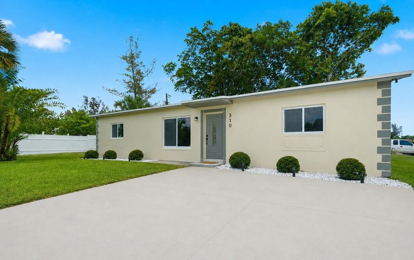 STUNNING FULLY RENOVATED HOME OFFERING MODERN DESIGN, HIGH-END - Beach Home for sale in Deerfield Beach, Florida on Beachhouse.com