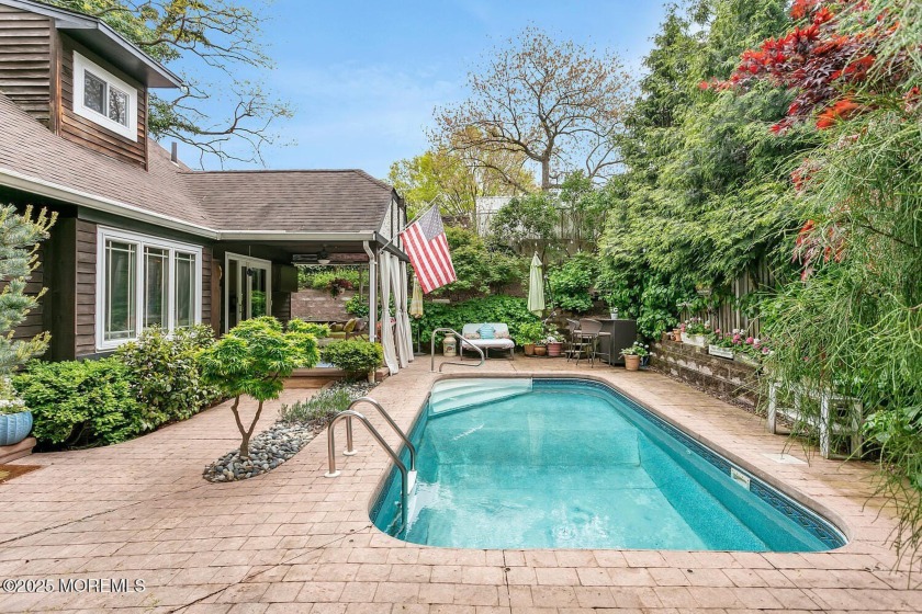 A standout Tudor style residence located near the beach with a - Beach Home for sale in Highlands, New Jersey on Beachhouse.com