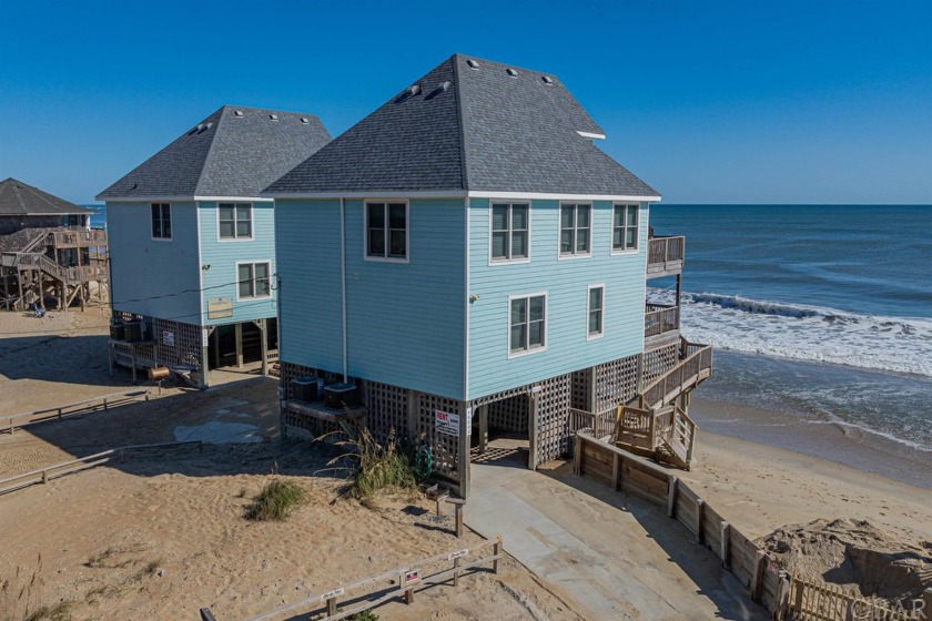 Discover this stunning oceanfront home in Buxton, offering - Beach Home for sale in Buxton, North Carolina on Beachhouse.com