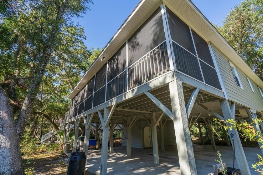 A hidden gem on Jungle Road, this 4Br/2Ba home is located on the - Beach Home for sale in Edisto Island, South Carolina on Beachhouse.com