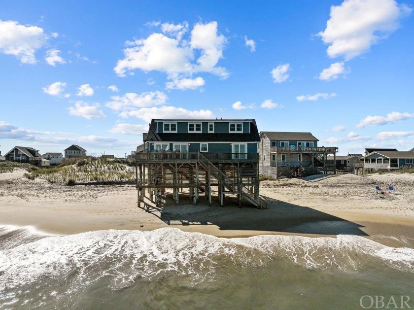 Sandy feet and sunglasses are the only requirements at this - Beach Home for sale in Nags Head, North Carolina on Beachhouse.com