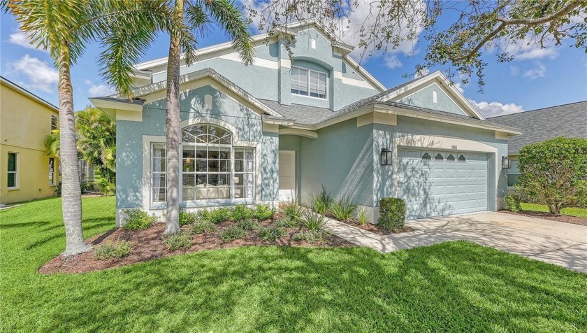 MOVE RIGHT IN! This stunning LAKEFRONT home is nestled in the - Beach Home for sale in Bradenton, Florida on Beachhouse.com