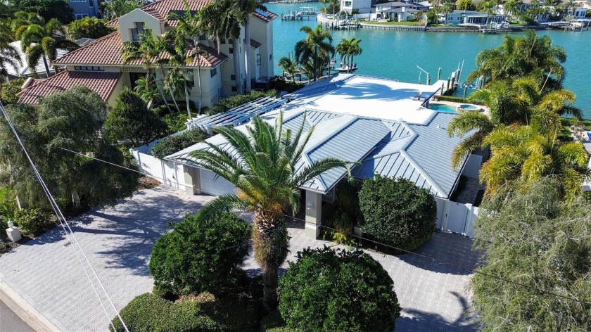 Welcome to 10074 Yacht Club Drive, a captivating haven for those - Beach Home for sale in Treasure Island, Florida on Beachhouse.com