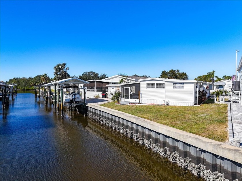 PRICE IMPROVEMENT!  Canal Living at it's best!  Updated charming - Beach Home for sale in Apollo Beach, Florida on Beachhouse.com