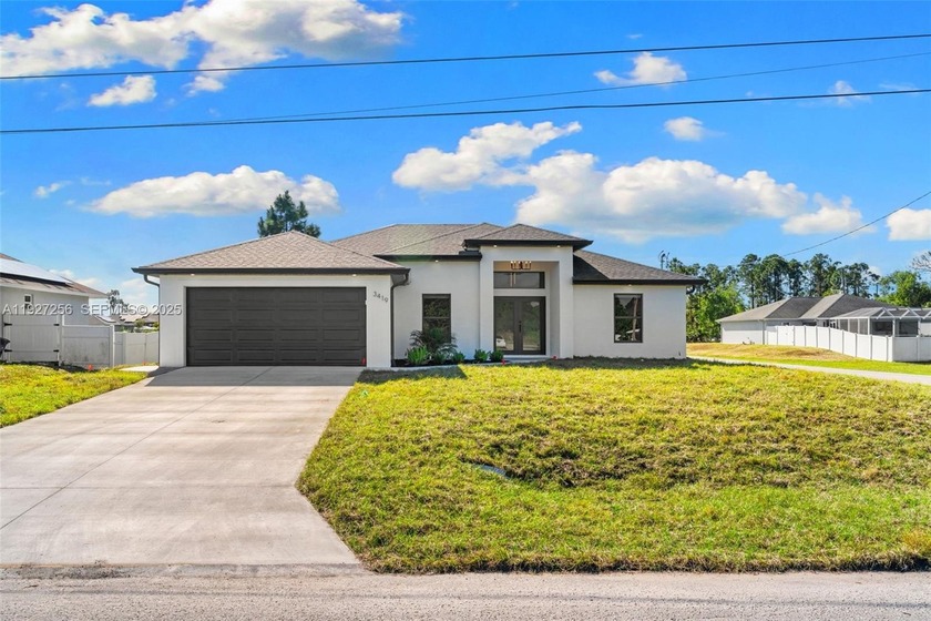 Welcome to this beautifully designed brand-new construction home - Beach Home for sale in Lehigh Acres, Florida on Beachhouse.com
