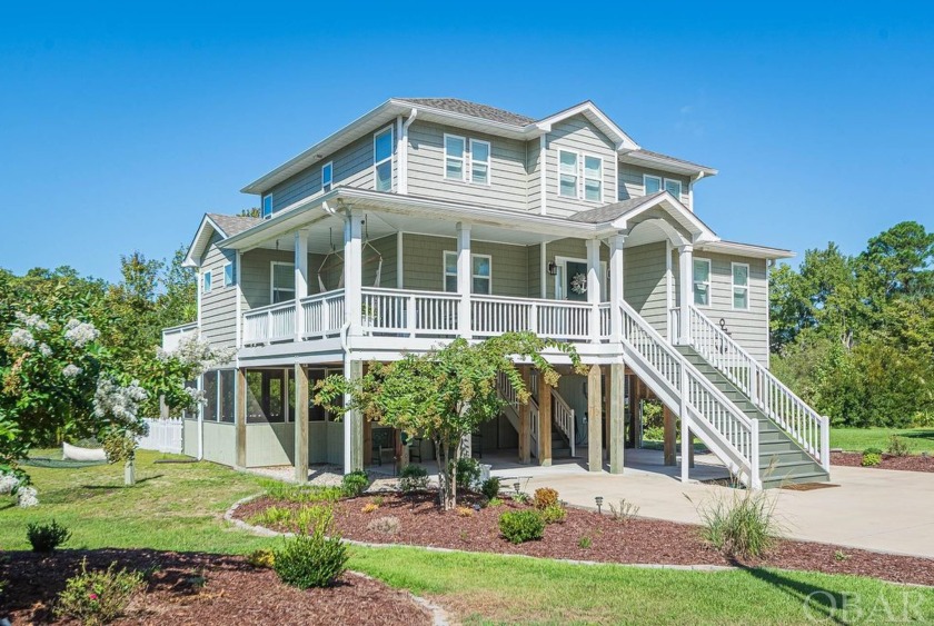 Discover this stunning 4-bedroom home, tucked away in a tranquil - Beach Home for sale in Kill Devil Hills, North Carolina on Beachhouse.com