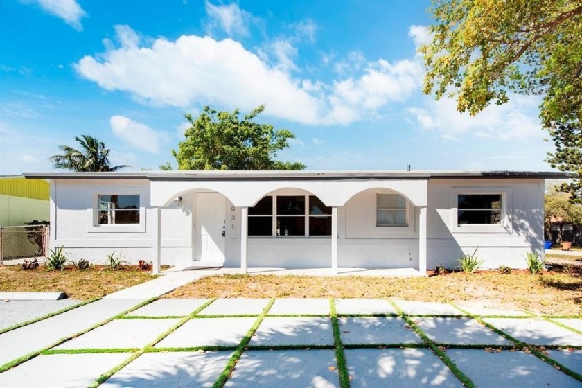 Stunning 5-bedroom, 3-bath corner home conveniently located near - Beach Home for sale in Deerfield Beach, Florida on Beachhouse.com