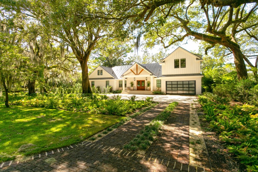 Sitting alongside the lake in the exclusive neighborhood of The - Beach Home for sale in Charleston, South Carolina on Beachhouse.com