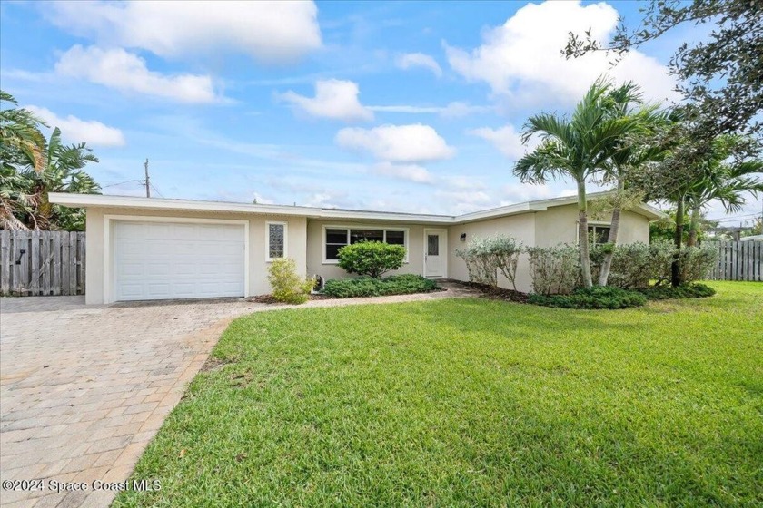 This stunning pool home, nestled on a spacious lot in Indian - Beach Home for sale in Indian Harbour Beach, Florida on Beachhouse.com