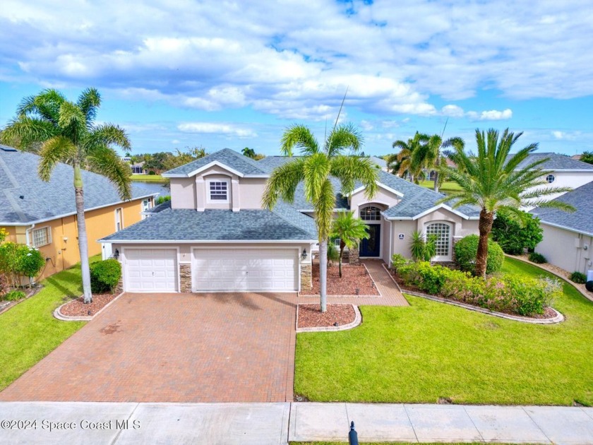 Stunning lakefront pool home in the highly desirable gated - Beach Home for sale in Rockledge, Florida on Beachhouse.com