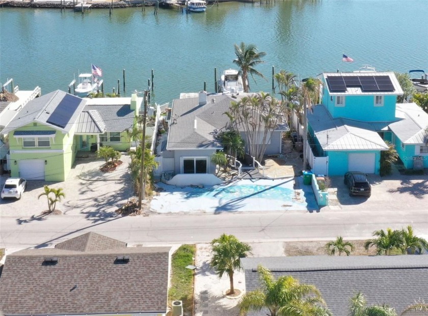 This prime waterfront property presents a rare chance for those - Beach Home for sale in Madeira Beach, Florida on Beachhouse.com