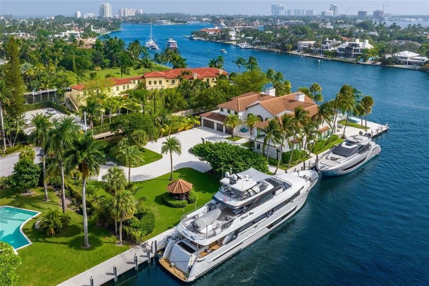 MAJOR PRICE IMPROVEMENT!! This timeless peninsula estate offers - Beach Home for sale in Fort Lauderdale, Florida on Beachhouse.com