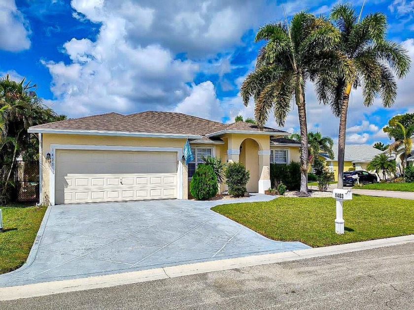 Corner lot home located in the community of Fairway Isles at - Beach Home for sale in Greenacres, Florida on Beachhouse.com