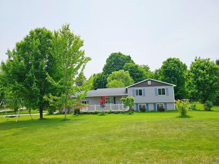 Escape to serenity with this charming 5 BEDROOMS house, all new - Beach Home for sale in Traverse City, Michigan on Beachhouse.com