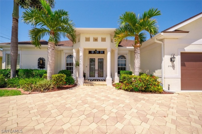 Welcome to this exquisite custom-built residence boasting - Beach Home for sale in Cape Coral, Florida on Beachhouse.com