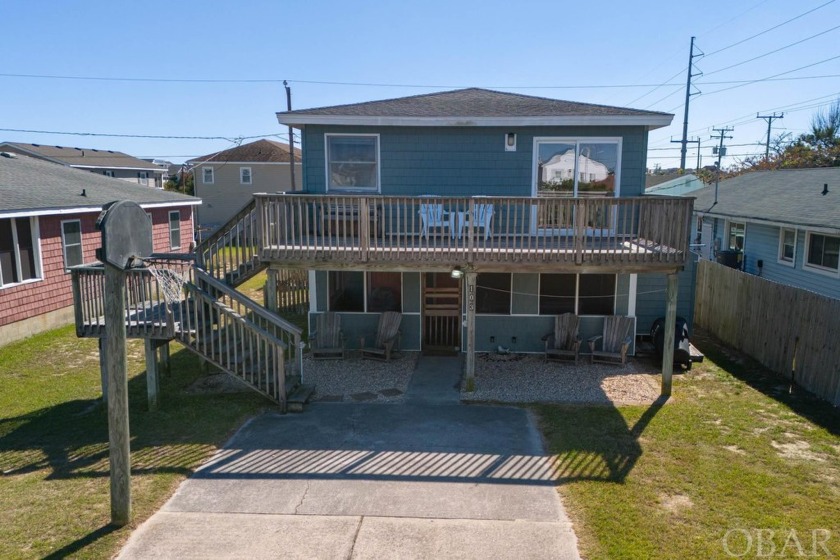 Welcome to this charming four-bedroom home located in the heart - Beach Home for sale in Kill Devil Hills, North Carolina on Beachhouse.com