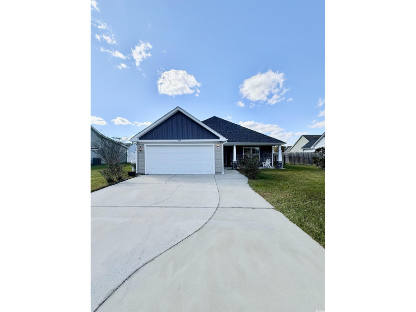 Welcome home to this CHARMING three bedroom, two bath home - Beach Home for sale in Longs, South Carolina on Beachhouse.com