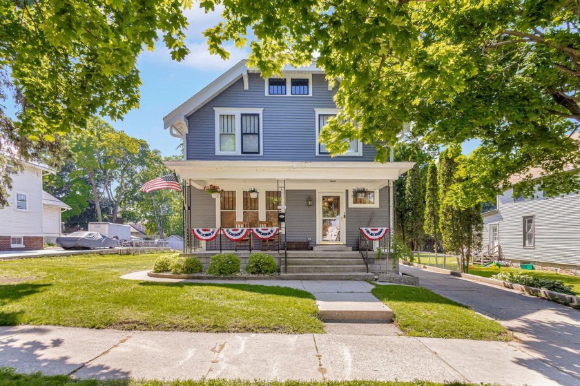 Full of warmth and character, this charming home features - Beach Home for sale in Manitowoc, Wisconsin on Beachhouse.com