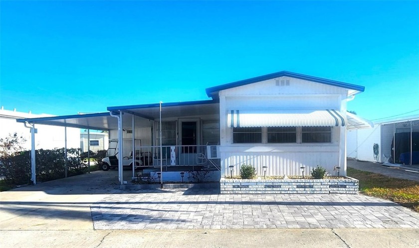 Welcome to this charming 2-bedroom, 1-bath mobile home in - Beach Home for sale in Bradenton, Florida on Beachhouse.com