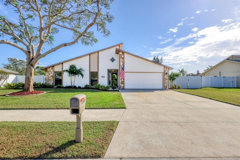 Welcome to your beautiful new home, surrounded by lush, mature - Beach Home for sale in Sarasota, Florida on Beachhouse.com