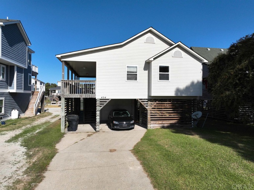 Nestled in the picturesque Colington Harbor, NC, this charming - Beach Home for sale in Kill Devil Hills, North Carolina on Beachhouse.com