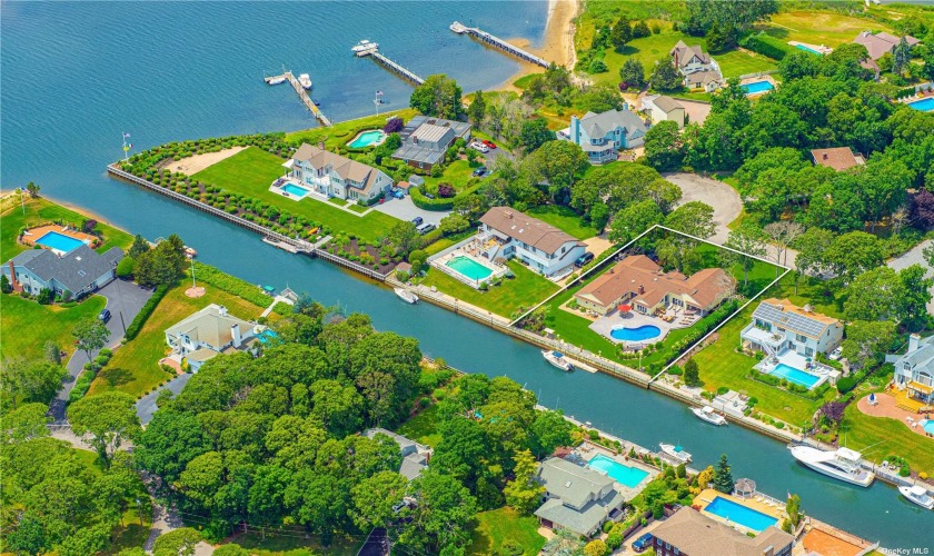 Located within the exclusive Old Harbor Colony Community in - Beach Home for sale in Hampton Bays, New York on Beachhouse.com