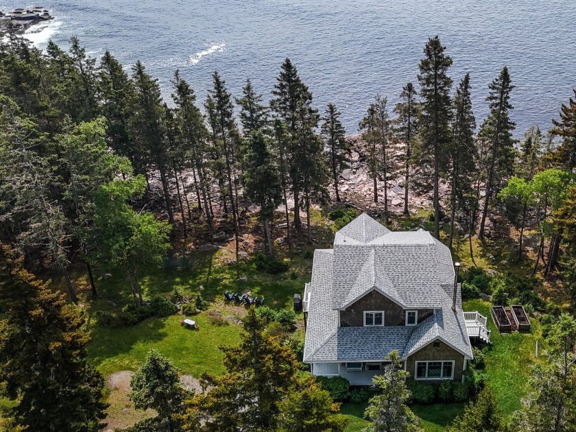 Sparkling, pink granite coastline with flat ''picnic rocks'' and - Beach Home for sale in Swans Island, Maine on Beachhouse.com