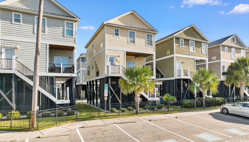 Just steps from the sand and the iconic Garden City Pier, this - Beach Home for sale in Murrells Inlet, South Carolina on Beachhouse.com