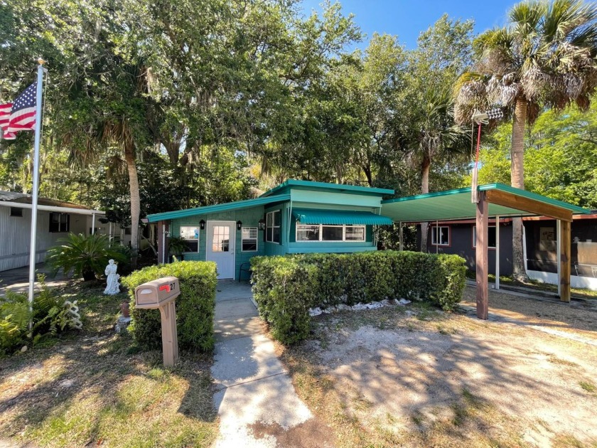 Truly a tropical paradise home! This single wide manufactured - Beach Home for sale in Ormond Beach, Florida on Beachhouse.com