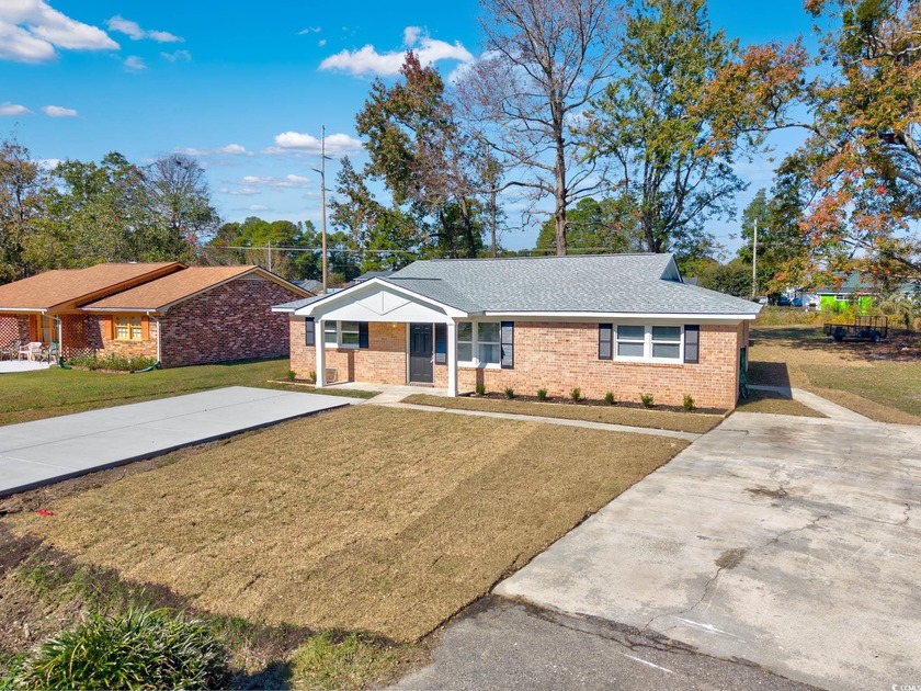 This beautiful all brick duplex sits on a spacious 0.35-acre lot - Beach Townhome/Townhouse for sale in Myrtle Beach, South Carolina on Beachhouse.com