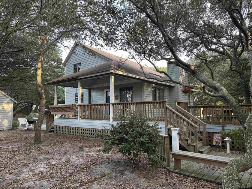 Absolutely charming cottage, nestled in the live oaks of - Beach Home for sale in Southern Shores, North Carolina on Beachhouse.com