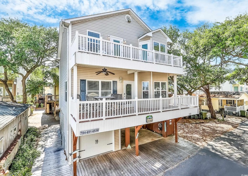 Feel the ocean breeze and hear the waves from the porches of the - Beach Home for sale in Myrtle Beach, South Carolina on Beachhouse.com