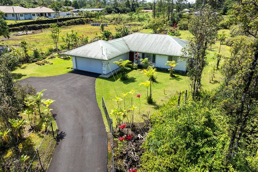 Discover modern comfort and ultimate energy independence in this - Beach Home for sale in Keaau, Hawaii on Beachhouse.com