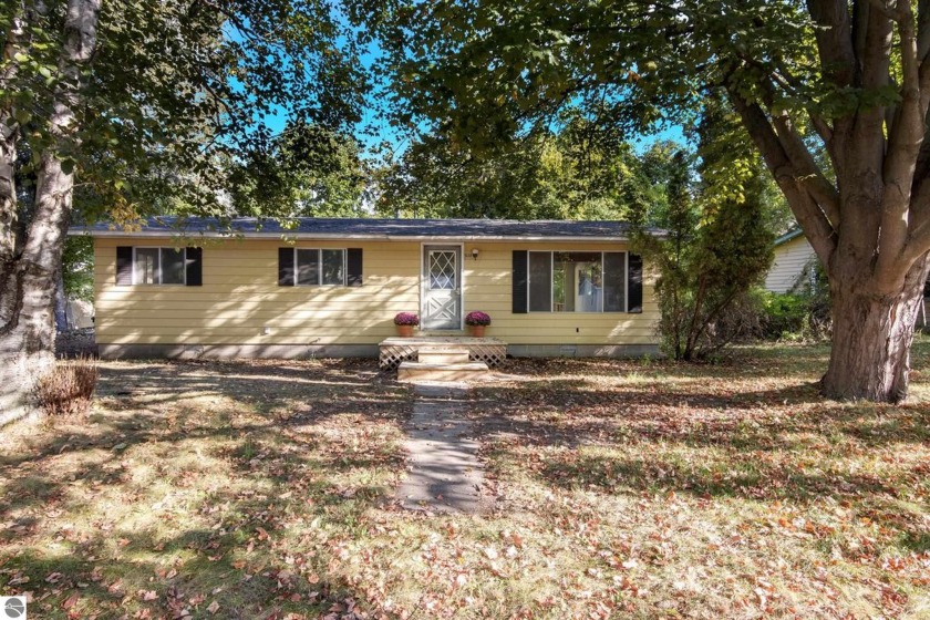 Welcome to this charming ranch-style home in the heart of - Beach Home for sale in Frankfort, Michigan on Beachhouse.com