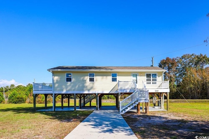 Welcome home to this spacious 4-bedroom, 3-bathroom home located - Beach Home for sale in Longs, South Carolina on Beachhouse.com