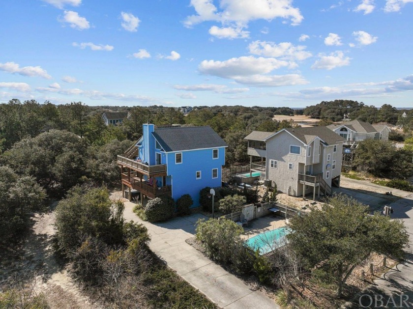 Nestled on a quiet cul-de-sac this 4-bed, 2-full bath home with - Beach Home for sale in Corolla, North Carolina on Beachhouse.com