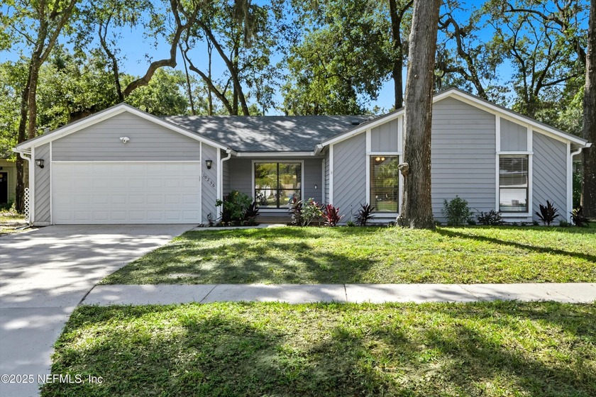 WHAT A FIND! This move-in ready home sits beautifully on one of - Beach Home for sale in Jacksonville, Florida on Beachhouse.com